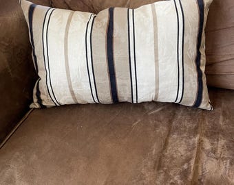 Tan and black striped lumbar pillow