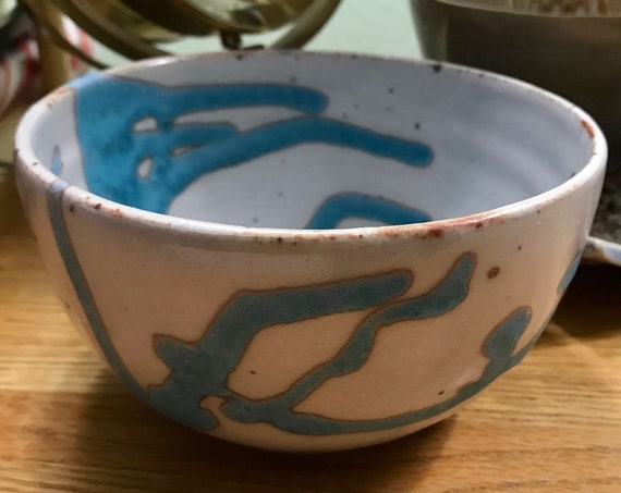 Ceramic Bowl with Rich Turquoise Swirling on a Background of White