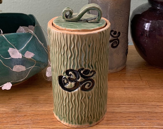 Textured Ceramic Jar with OHM symbol  in Soft Green with 3 white smudge sticks within