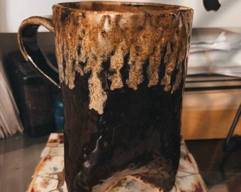 Textured Ceramic Tri-Footed Mug in Rich Plum with Coppery Accents