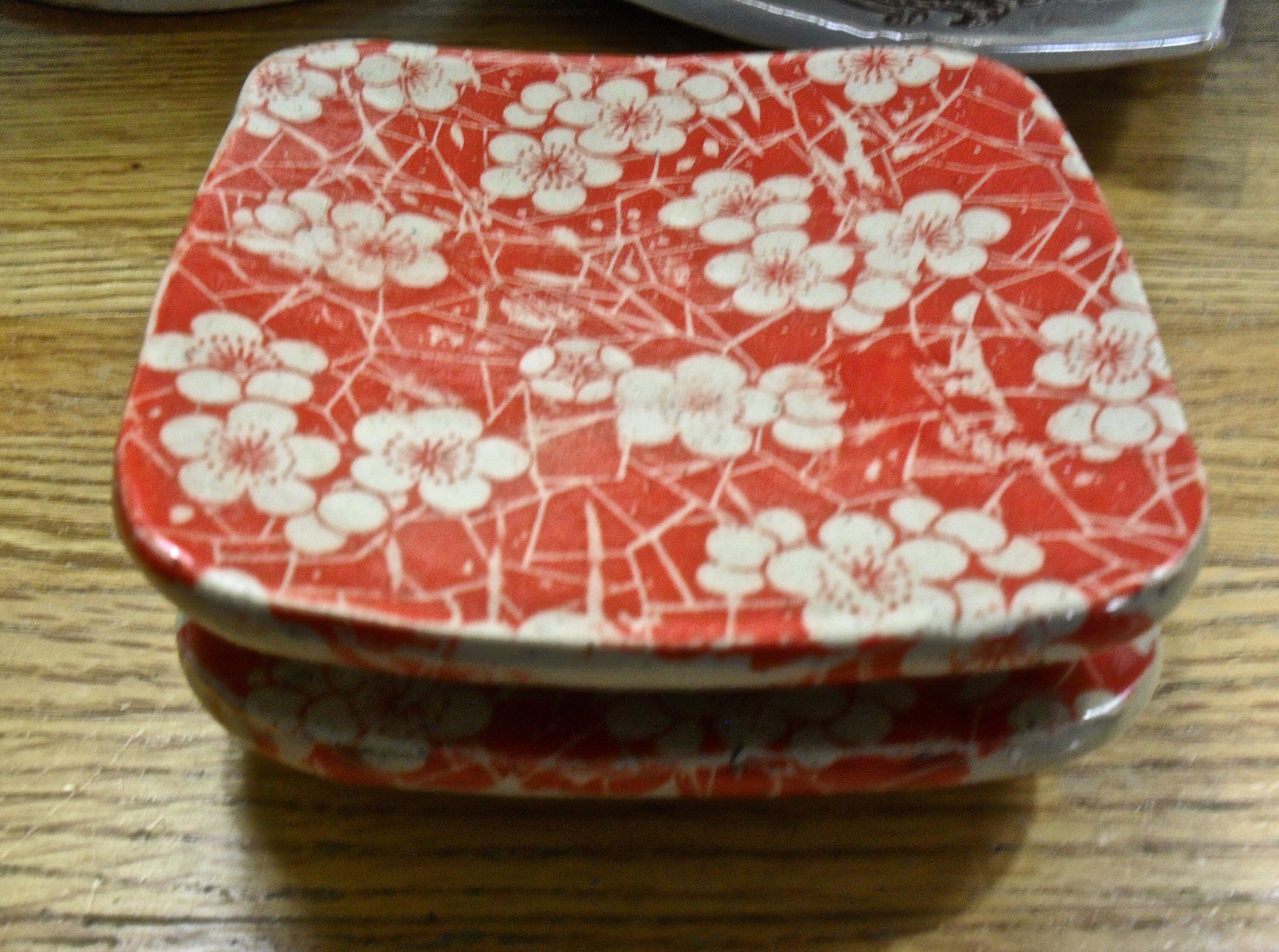 A Set of Two Small Ceramic Sushi Plates in Japanese Red Floral Design