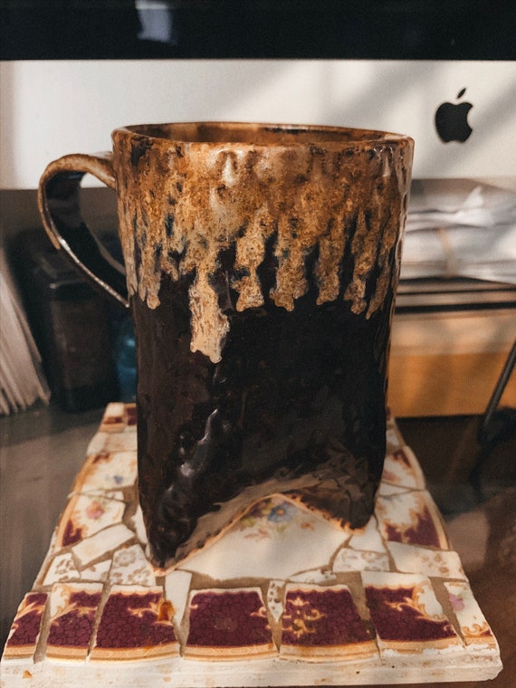 Textured Ceramic Tri-Footed Mug in Rich Plum with Coppery Accents