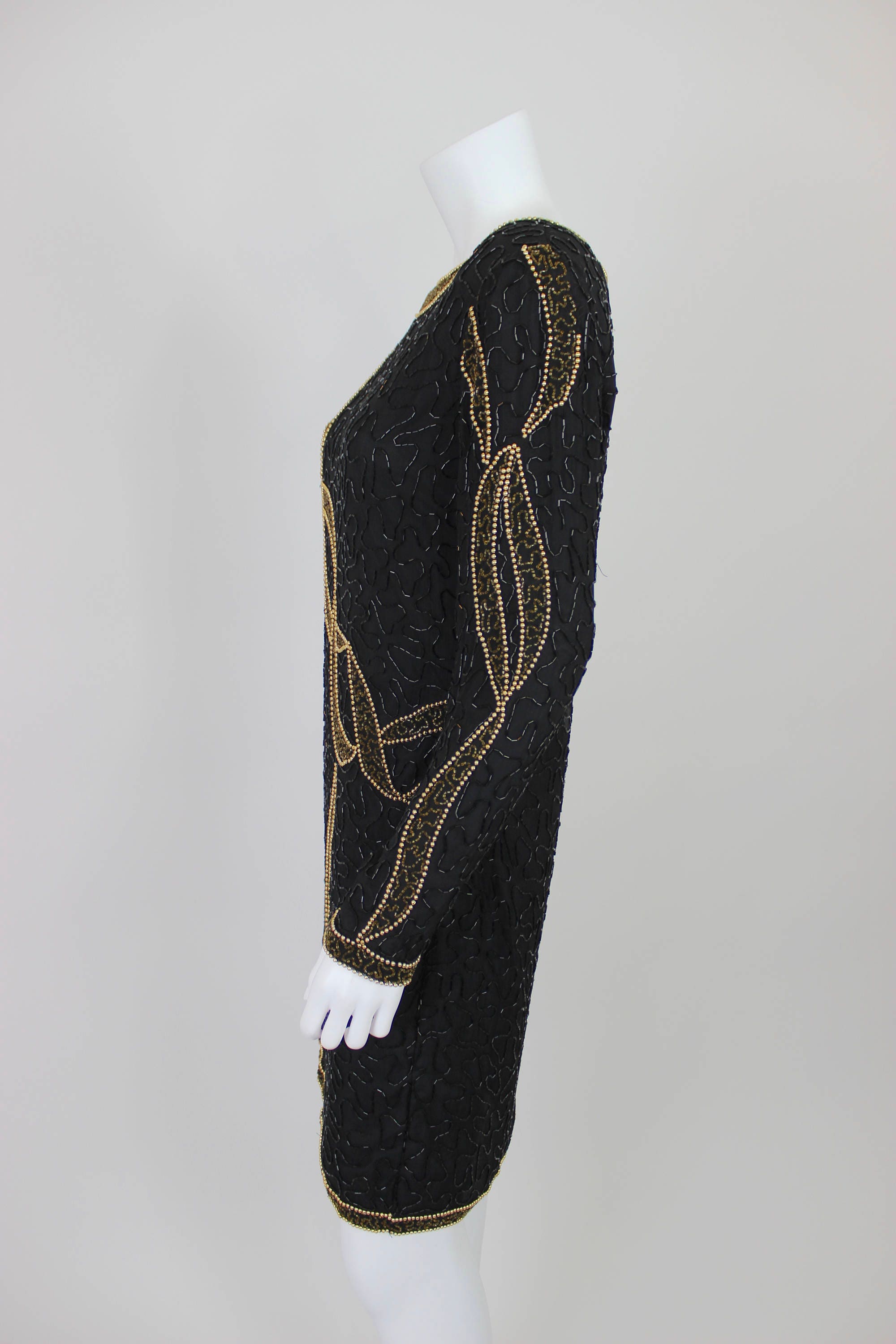 vintage black and gold sequin dress 1930's Black Velvet Puffed Sleeve Gown with Gold Sequin Top Eveliina Vintage