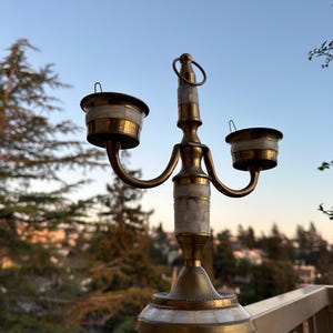 vintage candelabra made of brass and inlaid with mother of pearl candle holder