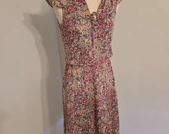 Vestido vintage sin mangas con estampado floral