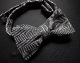 Gray and White Self Tie Bow Tie in Herringbone Pattern.