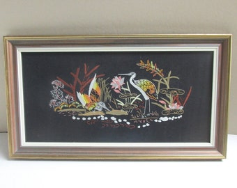 Vintage Embroidery of Birds Plants Flowers on Black Material in Wooden Frame Sized 22 3/4 x 12 3/4 inches, unsigned