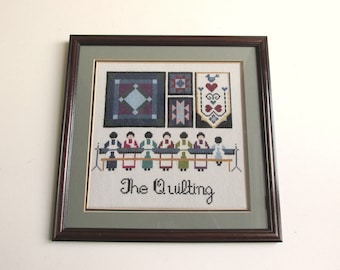 Vintage Cross Stitch Needlework Picture, 'The Quilting', Textile Wall Art in Frame Sized 13 x 12 7/8 inches