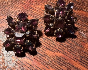Amethyst rhinestone clip on earrings circa 1940s with nanette and emerald cut stones