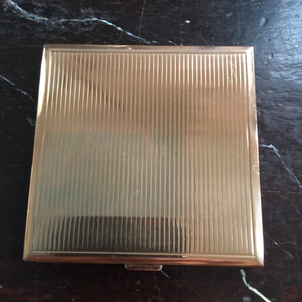 Lilly Dache compact,powder, made in Switzerland,circa 1955 in goldtone