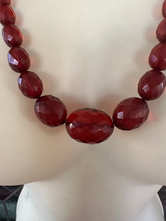 A graduated faceted bakelite cherry red beaded ne… - image 3