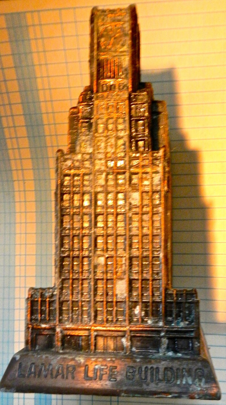 Lamar Life insurance Co .Jackson Ms. pot metal bank