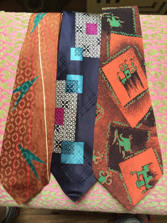 A group of 1940s neckties in figurals and geometri