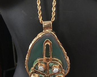 Eighties Brutalist style  pendant with pearls,turquoise,agate and crystal set in gold metal