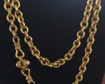 Gold Florentine ribbed chain with pearl and rhinestone attachment circa 1990