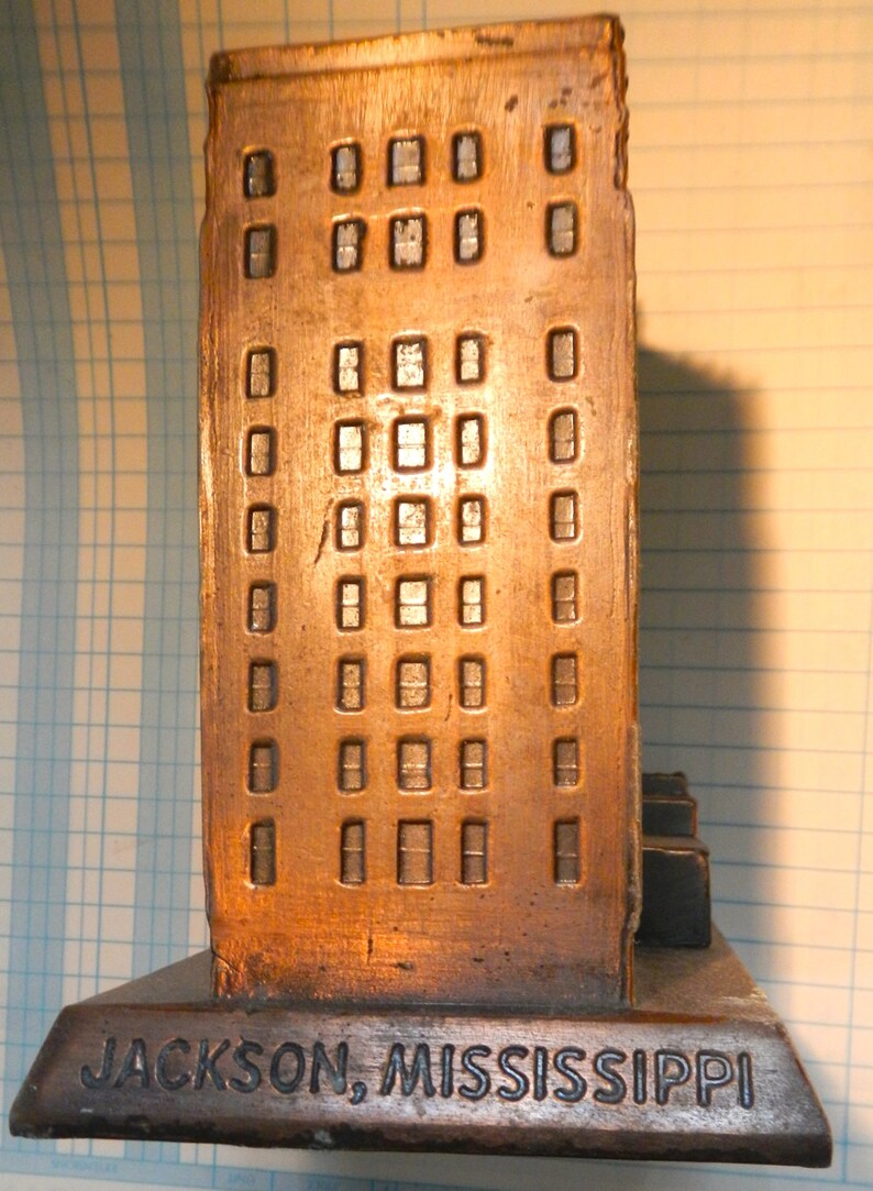 Lamar Life insurance Co .Jackson Ms. pot metal bank