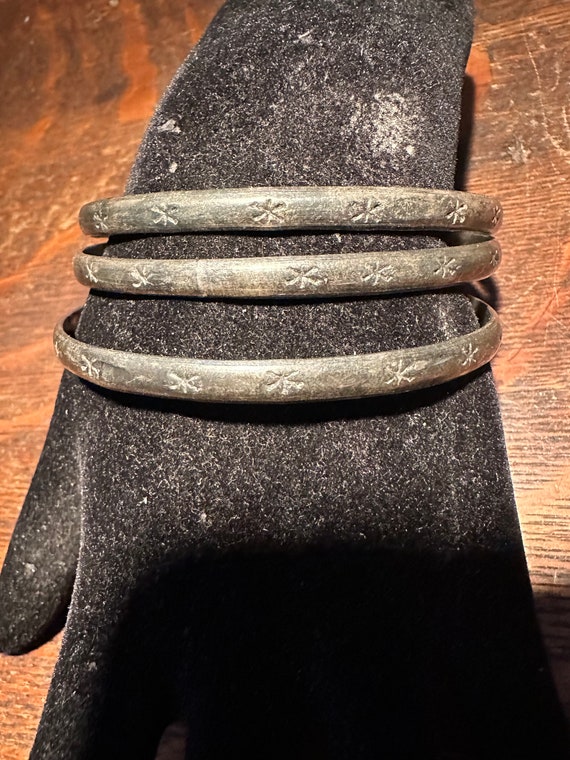 A set of  three incised sterling bangles ,made in… - image 1