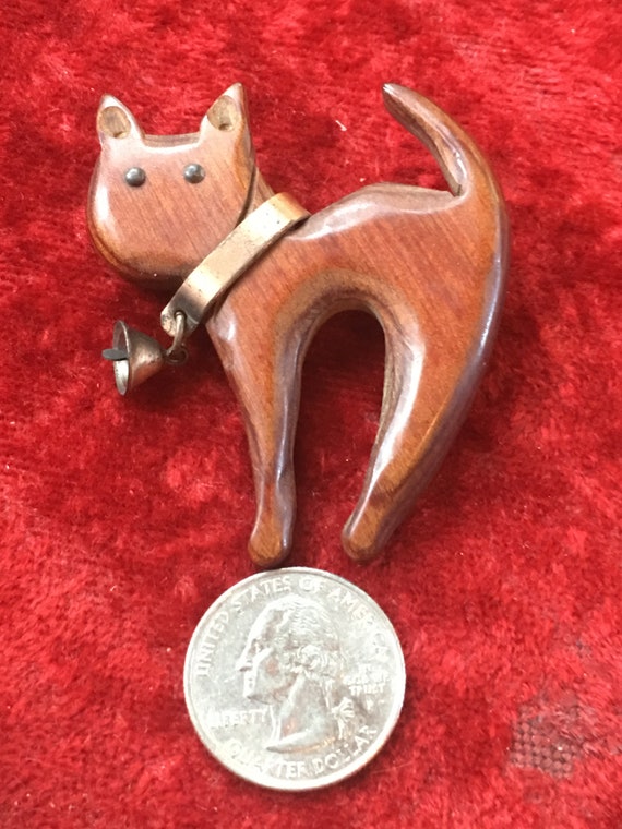 1940s wooden cat brooch with workable bell