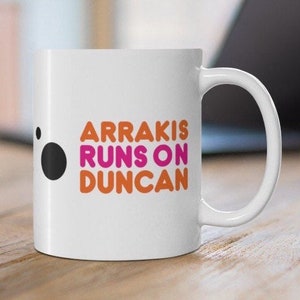 Funny Dune mug - "Arrakis Runs On Duncan," Duncan Idaho, master swordsman from Dune - Ceramic Mug 11oz and 15 oz sizes