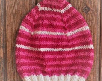 Hand knit baby hat. 6-12 months. Pink and Cream striped.  Woolly baby hat. 100% Acrylic.