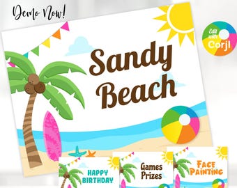 May include: A white sign with the words "Sandy Beach" in brown, featuring a beach scene with palm trees, a surfboard, and a colorful beach ball. Smaller signs say "Happy Birthday", "Games Prizes", and "Face Painting".