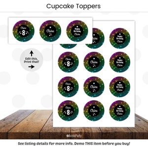 May include: Twelve round cupcake toppers with a rainbow and black background. The toppers feature the name "Claire" and the number "8" in white text. Some toppers also include the text "Happy Birthday Claire".