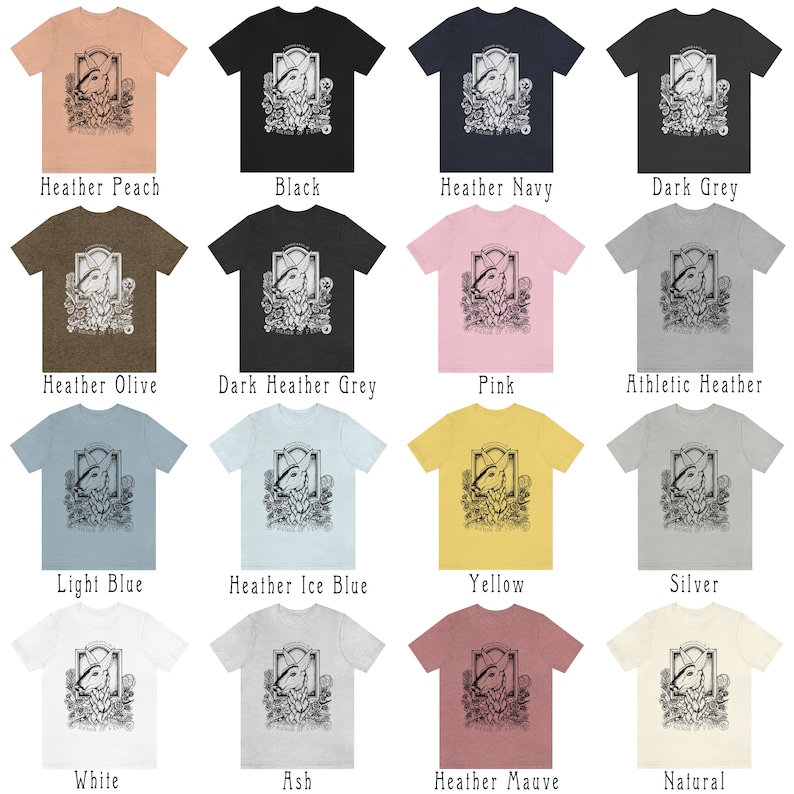 May include: A collection of t-shirts in various colors, featuring a black and white illustration of a wolf's head with floral accents. The text "Friends by Fire" is printed below the image.