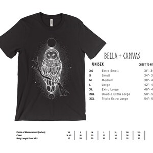 May include: Black t-shirt with a white owl and moon graphic. The shirt is available in sizes XS to 3XL. The size chart shows chest measurements in inches.