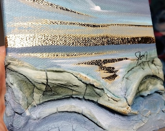Pintura abstracta de paisaje con textura y técnica mixta, realizada con pan de oro.