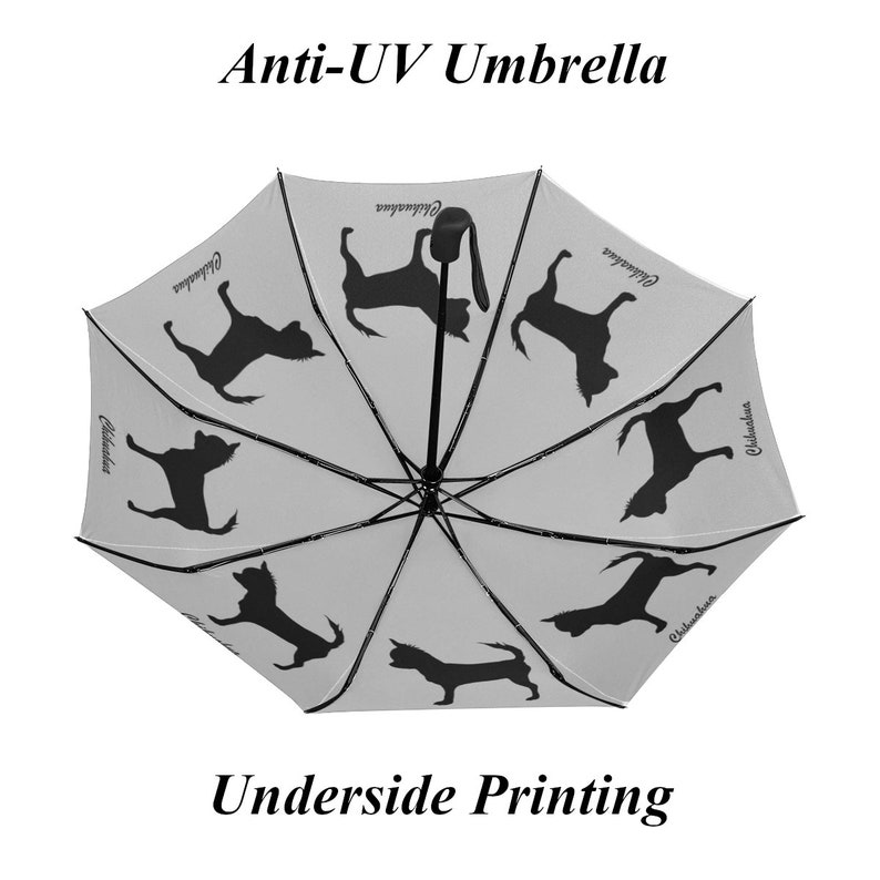 May include: An open, light gray Anti-UV umbrella with black silhouettes of Chihuahuas. The text "Anti-UV Umbrella" and "Underside Printing" are printed on the umbrella. The word "Chihuahua" is printed on the umbrella.