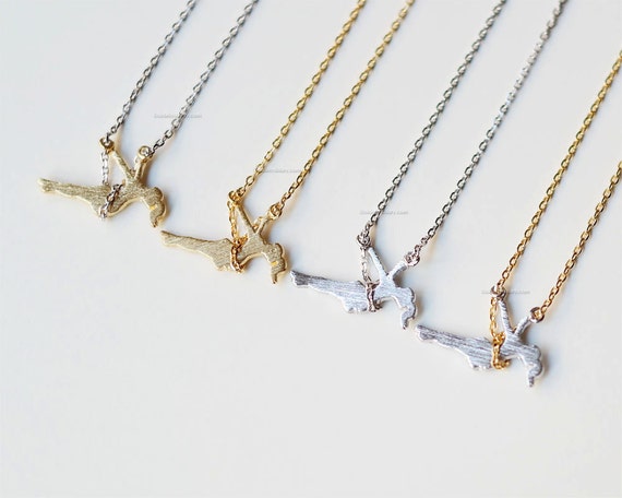 Girl on a swing necklace clearance