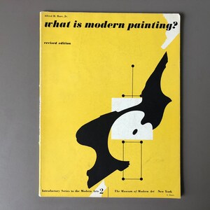May include: A book cover with the title "what is modern painting?" in black font on a yellow background. The cover features a black and white abstract design. The text "revised edition" is also visible.