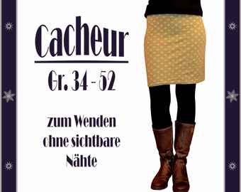 May include: A sewing pattern for a reversible skirt with the text "Cacheur Gr. 34 - 52 zum Wenden ohne sichtbare Nähte". The skirt is yellow with a small geometric pattern and has a black waistband.