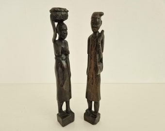 Set of two hand carved wooden statuettes, man and woman, african culture