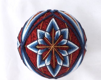 Japanese Temari Ball handmade by me "Four flowers in a window" will make a unique gift. Blue flower over Maroon.