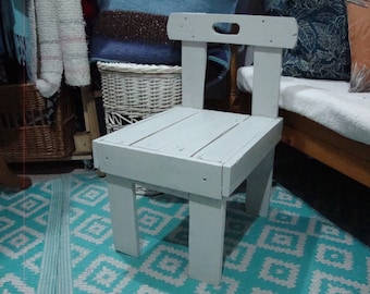 Small wooden chair.
