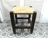 French farmhouse stool with straw seat.