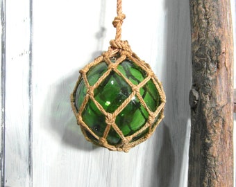 Green glass fishing ball float, witches ball.