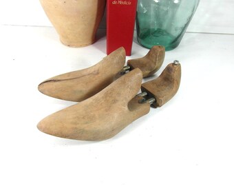 Wooden shoe stretchers, cobbler tools, wood shoe forms, 2 piece bendable shoemakers molds. French vintage decor, wooden shoe display.