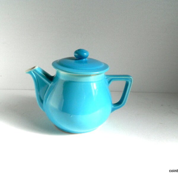 Azur blue teapot, coffee pot. Porcelain.