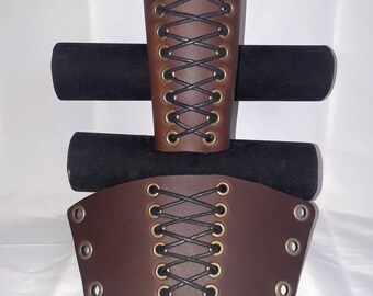 Brown gauntlets with corset style lace up in the center