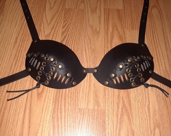 Black leather C bra with antique brass hardware and lace Up on bottom