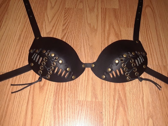 Black leather C bra with antique brass hardware and lace Up on bottom