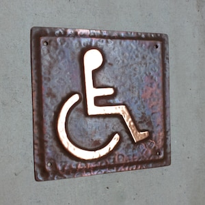 Wheelchair user disabled toilet lavatory sign door Plaque 4.2&quot;&quot;/105mm square in patinated or hammered copper with fixings hgs