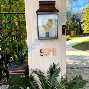 House numbers  in polished  Copper floating  6"/150 mm high in Antigoni font up