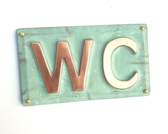 Copper door plaque WC toilet lavatory sign  in 2"/50mm high Antigoni in patinated or hammered finish ? hug