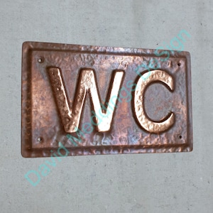 Copper door plaque WC toilet lavatory sign  in 2"/50mm high Antigoni in patinated or hammered finish hg