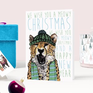 Cartolina di Natale del ghepardo dei gatti carolingi