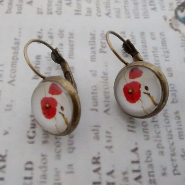 Red poppies in white background glass cabochon French back earrings