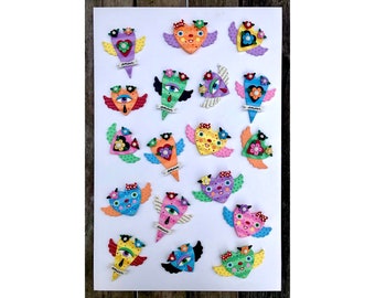 Your choice of 18 Winged Striped Hearts with Eyes and Flowers Clay Wall Hangings